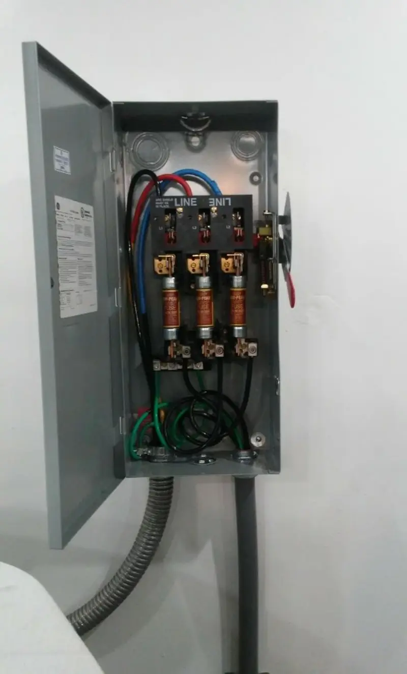 Three-phase disconnect switch installed for Smoke Detector Installation in Tifton